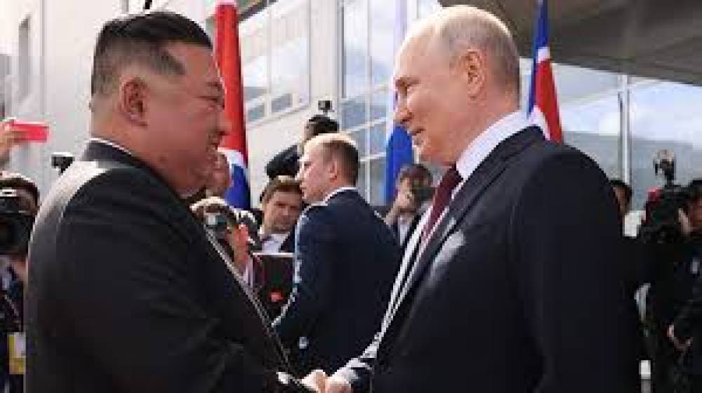 Kim Jong Putini təbrik etdi